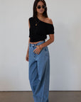 Baggy jeans. Button and zipper fly. Five pocket construction. Unlined.