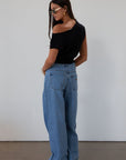 Baggy jeans. Button and zipper fly. Five pocket construction. Unlined.