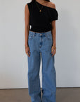 Baggy jeans. Button and zipper fly. Five pocket construction. Unlined.