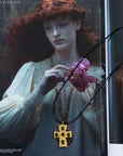 Green zircon 18k gold plated non-tarnish cross charm necklace. Adjustable rope necklace with lobster clasp. 