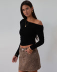 Knit crop top. Long sleeves. Ruched sides. Fully lined. black off the shoulder top. going out top. black long sleeve