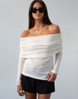 Ivory Ribbed knit sweater. Folded off the shoulder neckline. Long sleeves. Unlined. cream sweater. white sweater. fall outfit