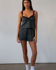 green Checkered woven shorts. Lace trim. Elastic waistband. Tie waist. Back pockets. Fully lined. fall outfit