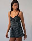 green Checkered woven cropped tank. Lace trim. Adjustable straps. Front tie. Elastic back. Partially lined. fall outfit