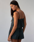 green Checkered woven shorts. Lace trim. Elastic waistband. Tie waist. Back pockets. Fully lined. fall outfit