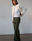 Woven utility pants. Button fly. Four pocket construction. Unlined. green pants. fall outfit.