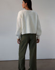 Woven utility pants. Button fly. Four pocket construction. Unlined. green pants. fall outfit.