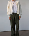 Woven utility pants. Button fly. Four pocket construction. Unlined. green pants. fall outfit.