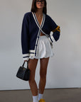 Striped crochet knit cardigan. Front button down closure. Unlined. sweater cardigan. blue cardigan. fall outfit.