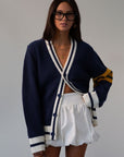 Striped crochet knit cardigan. Front button down closure. Unlined. sweater cardigan. blue cardigan. fall outfit.