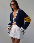 Striped crochet knit cardigan. Front button down closure. Unlined. sweater cardigan. blue cardigan. fall outfit.