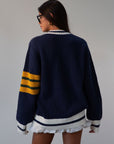 Striped crochet knit cardigan. Front button down closure. Unlined. sweater cardigan. blue cardigan. fall outfit.