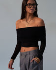 Knit top. Folded off the shoulder neckline. Long sleeves. Unlined/sheer. black off the shoulder long sleeve. fall outfit