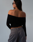 Knit top. Folded off the shoulder neckline. Long sleeves. Unlined/sheer. black off the shoulder long sleeve. fall outfit