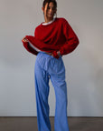 Striped woven pants. Elastic waistband with drawstring closure. Side pockets. Unlined. blue boxer pants. fall outfit. cute loungewear.