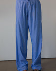 Striped woven pants. Elastic waistband with drawstring closure. Side pockets. Unlined. blue boxer pants. fall outfit. cute loungewear.