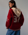 Fuzzy crochet knit sweater. Hoodie. Exposed front zipper closure. Front pockets. Unlined. red sweater. fall outfit. red zip up sweater