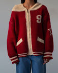 Fuzzy crochet knit sweater. Hoodie. Exposed front zipper closure. Front pockets. Unlined. red sweater. fall outfit. red zip up sweater