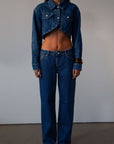 Straight leg jeans. Button and zipper fly. Five pocket construction. Unlined.