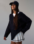 Pleated knit skirt. Elastic waistband. Shorts lining. white skirt. tennis skirt. fashion tennis skirt. preppy skirt. preppy outfit. fall outfit