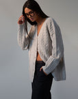 Fuzzy cable knit cardigan. Long sleeves. Front button down closures. Unlined. grey cardigan. grey sweater. fall outfit