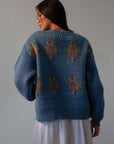 Crochet knit cardigan. Front button down closure. blue sweater cardigan. fall outfit. blue cardigan. blue sweater cardigan. grandma looking sweater