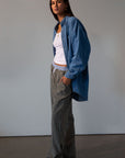 Plaid woven pants. Elastic waistband. Faux button fly. Side pockets. Fully lined. lounge pants. boxer pants