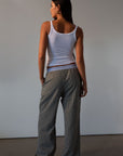 Plaid woven pants. Elastic waistband. Faux button fly. Side pockets. Fully lined. lounge pants. boxer pants