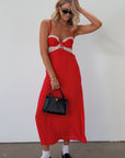 Polka dot printed woven maxi dress. Lace details. Adjustable straps. Underwire cups. Back hook and eyes and zipper closures. Unlined. red polka dot midi dress. summer dress. fall dress.