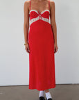 Polka dot printed woven maxi dress. Lace details. Adjustable straps. Underwire cups. Back hook and eyes and zipper closures. Unlined. red polka dot midi dress. summer dress. fall dress.