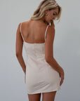 Seamed denim dress. Adjustable straps. Back zipper closure. Fully lined. cream mini dress. fall outfit