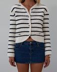 Striped crochet knit cropped cardigan. Front button down closure. Faux front pockets. Unlined. fall outfit. fall top. striped cardigan