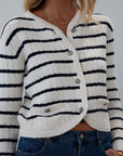 Striped crochet knit cropped cardigan. Front button down closure. Faux front pockets. Unlined. fall outfit. fall top. striped cardigan