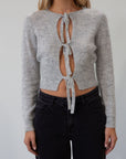 Fuzzy crochet knit sweater. Front tie closures. Long sleeves. Unlined. grey sweater. grey fall sweater. tie front sweater. fall outfit