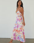 Printed textured woven maxi dress. Adjustable straps. Side hook and eye and zipper closures. Ruffle trim. Unlined. Summer maxi dress. wedding guest dress.