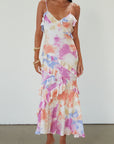 Printed textured woven maxi dress. Adjustable straps. Side hook and eye and zipper closures. Ruffle trim. Unlined. Summer maxi dress. wedding guest dress.