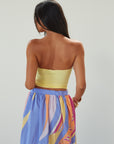 Knit tube top. Elastic neckline. Flower detail. Ruched front. Unlined. yellow tube top. summer top.