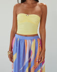 Knit tube top. Elastic neckline. Flower detail. Ruched front. Unlined. yellow tube top. summer top.