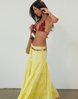 Woven tiered maxi skirt. Elastic waist with drawstring closure. Partially lined. yellow maxi skirt. summer maxi skirt.