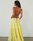 Woven tiered maxi skirt. Elastic waist with drawstring closure. Partially lined. yellow maxi skirt. summer maxi skirt.
