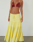 Woven tiered maxi skirt. Elastic waist with drawstring closure. Partially lined. yellow maxi skirt. summer maxi skirt.