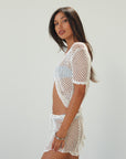 open knit corchet skirt. open knit crochet top. open knit crochet set. white crochet set. beach cover up. pool cover up. beach vacation outfit.