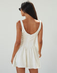 Woven sleeveless dress. Boning in bodice. Back hook and eye closures. Fully lined. off white mini dress. white mini dress. cream mini dress. bridal shower dress. bridal dress