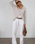 Fuzzy heather crochet knit cardigan. Front button down closures. Unlined.