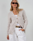 Fuzzy heather crochet knit cardigan. Front button down closures. Unlined.