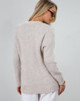Fuzzy heather crochet knit cardigan. Front button down closures. Unlined.