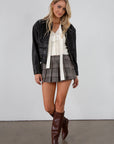 Plaid flannel pleated skirt. Side hook and eye and zipper closures. Knit shorts lining. plaid mini skirt. fall skirt. fall bottom. fall outfit.