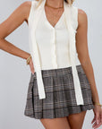 Plaid flannel pleated skirt. Side hook and eye and zipper closures. Knit shorts lining. plaid mini skirt. fall skirt. fall bottom. fall outfit.
