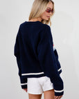 Fuzzy crochet knit sweater. Crewneck. Long sleeves. Unlined. apres sweater. fall sweater. sweater for fall. cute fall sweater. navy blue sweater