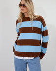 Fuzzy knit striped sweater. Crewneck. Long sleeves. Unlined. blue and brown striped sweater. fall top. fall sweater. fall outfit.